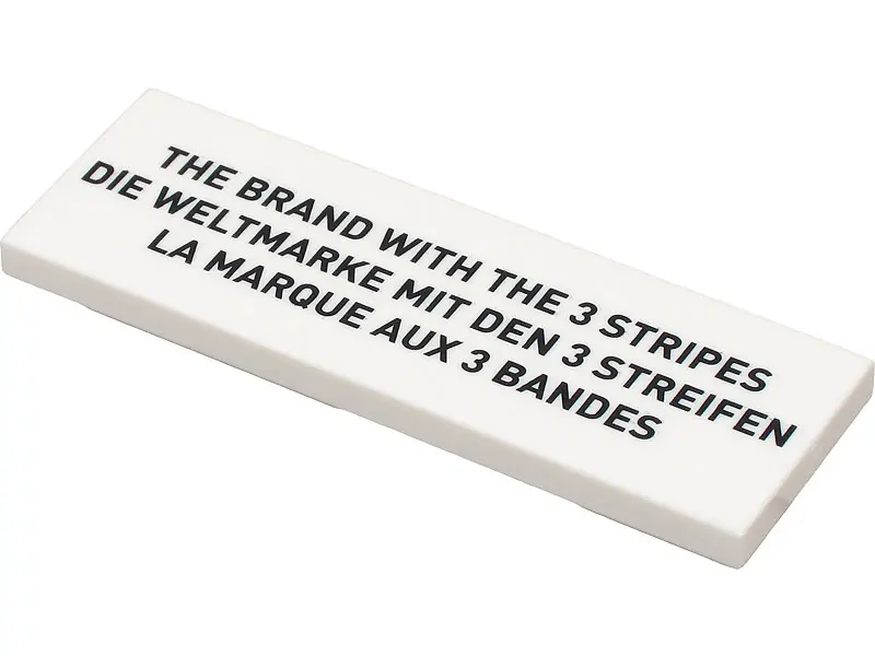 White Tile 2 x 6 with Black 'THE BRAND WITH THE 3 STRIPES', 'DIE WELTMARKE MIT DEN 3 STREIFEN', and 