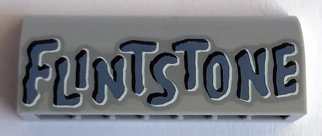 Light Bluish Gray Slope, Curved 1 x 4 x 1 1/3 with 'FLINTSTONE' Pattern