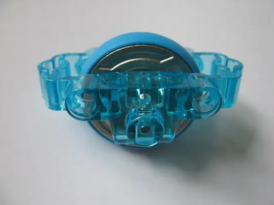 Trans-Light Blue Technic Brick 3 x 6 x 2 with Metal Flywheel and Dark Azure Tire (Chima Rip Cord Bas