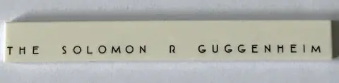 White Tile 1 x 8 with 'THE SOLOMON R GUGGENHEIM' Pattern