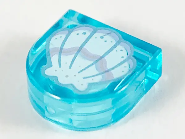Trans-Light Blue Tile, Round 1 x 1 Half Circle Extended with White Clam Shell, Silver and Metallic L