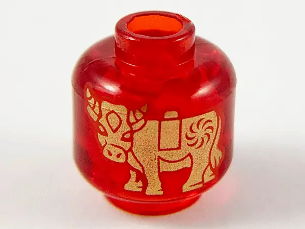 Trans-Red Minifigure, Head without Face with Gold Ox / Bull Pattern on Both Sides