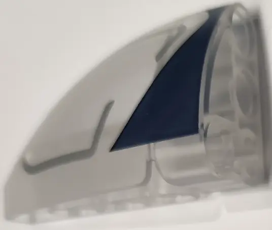 Trans-Clear Technic, Panel Curved 5 x 3 x 2 Corner Quarter Ellipse, Right with Dark Blue Edge and Si