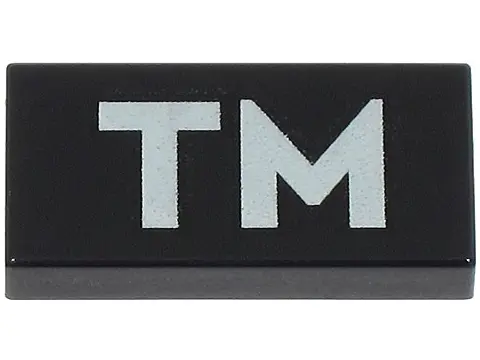 Black Tile 1 x 2 with Light Bluish Gray 'TM' Pattern