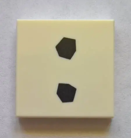White Tile 2 x 2 with 2 Black Hexagons Pattern (BrickHeadz Olaf Abdomen)