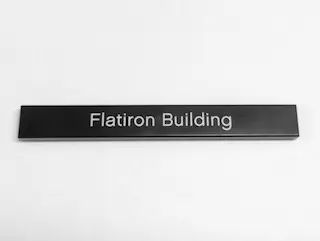Black Tile 1 x 8 with 'Flatiron Building' Pattern