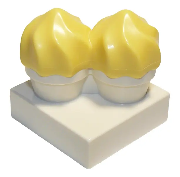 White Duplo Cupcakes with Molded Bright Light Yellow Swirl Icing Pattern