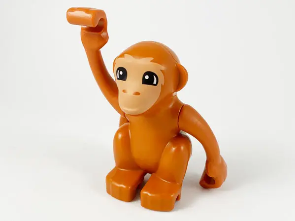 Dark Orange Duplo Monkey, Curled Tail Turned to Side with Nougat Face Pattern