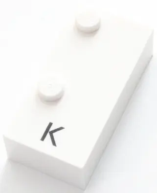 White Brick, Braille 2 x 4 with 2 Studs with Black Capital Letter K Pattern (dots-13 ⠅)