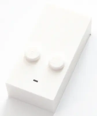 White Brick, Braille 2 x 4 with 2 Studs with Black Dash / Hyphen / Minus Sign (-) Pattern (dots-36 ⠤