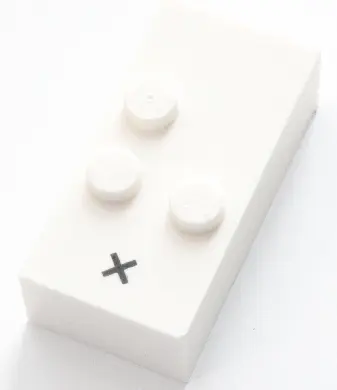 White Brick, Braille 2 x 4 with 3 Studs with Black Multiplication Sign (×) Pattern (dots-236 ⠦) (Eng