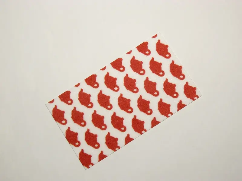 White Duplo, Cloth Towel 5 x 9 cm with Red Teapots Pattern