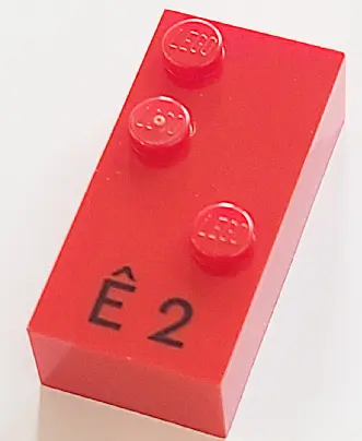 Red Brick, Braille 2 x 4 with 3 Studs with Black Capital Letter E with Circumflex (Ê) / Number 2 Pat