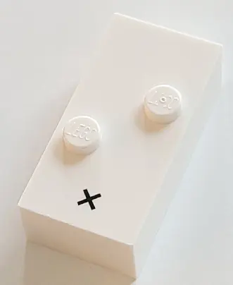 White Brick, Braille 2 x 4 with 2 Studs with Black Multiplication Sign (×) Pattern (dots-35 ⠔) (Fren