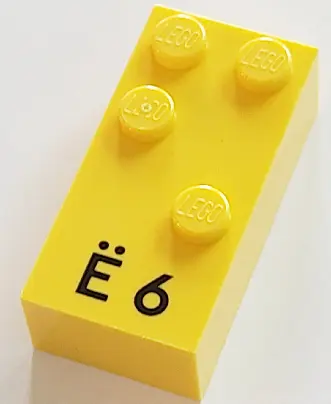 Yellow Brick, Braille 2 x 4 with 4 Studs with Black Capital Letter E with Diaeresis (Ë) / Number 6 P