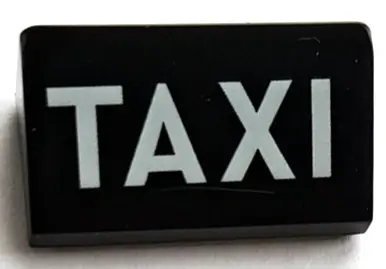 Black Slope 30 1 x 2 x 2/3 with White 'TAXI' Pattern
