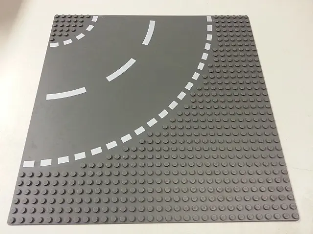 Dark Bluish Gray Baseplate, Road 32 x 32 6-Stud Curve with White Dashed Lines Pattern