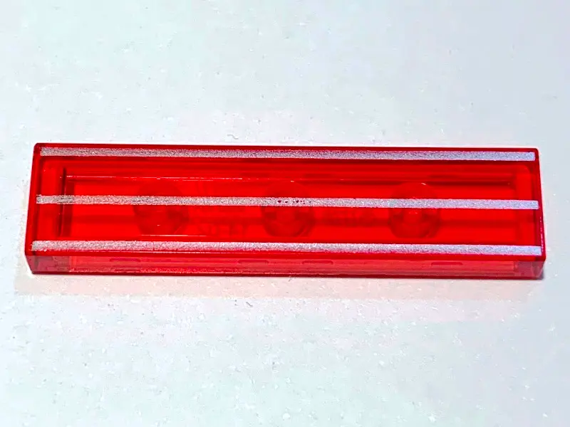 Trans-Red Tile 1 x 4 with 3 Silver Stripes Pattern