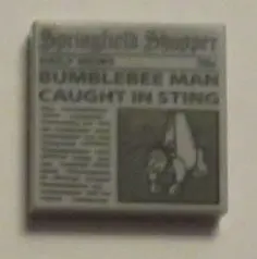 Light Bluish Gray Tile 2 x 2 with Newspaper 'Springfield Shopper' and 'BUMBLEBEE MAN CAUGHT IN STING