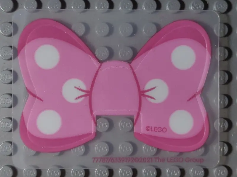 Plastic Bow with White Polka Dots on Bright Pink and Dark Pink Background Pattern