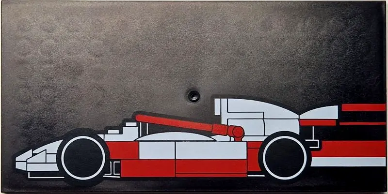 Black Tile 8 x 16 with Bottom Tubes, Textured Surface with Red and White LEGO Formula 1 Race Car Pro