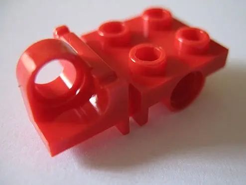 Red Plate, Modified 2 x 2 with Pin Hole on Side and Axle Hole on Bottom