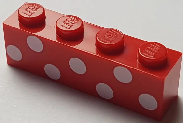 Red Brick 1 x 4 with 7 White Polka Dots Pattern