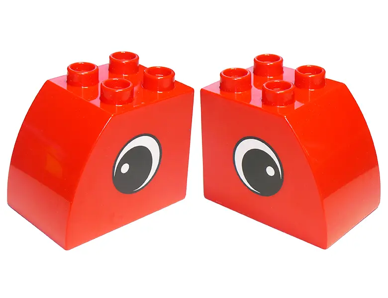 Red Duplo, Brick 2 x 3 x 2 Slope Curved with Circled Black Eye with White Pupil Pattern on Both Side