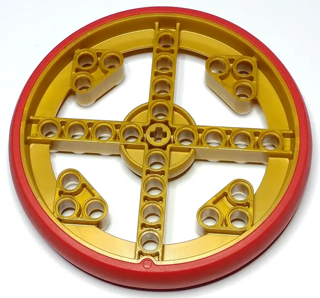 Pearl Gold Wheel 88 x 14 Technic with Axle Hole and 28 Pin Holes with Molded Red Hard Rubber Tire Pa