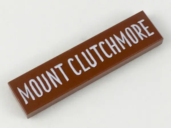 Reddish Brown Tile 1 x 4 with White 'MOUNT CLUTCHMORE' Pattern