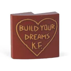 Reddish Brown Slope, Curved 2 x 2 x 2/3 with 'BUILD YOUR DREAMS K.F.' in Outlined Heart Pattern