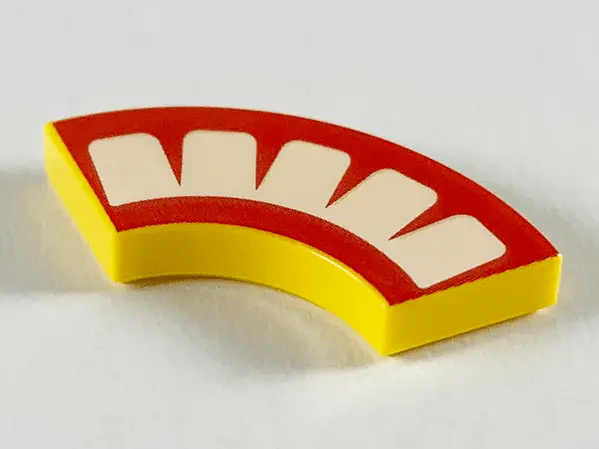 Yellow Tile, Round Corner 2 x 2 Macaroni with Red Mouth with 5 White Teeth Pattern