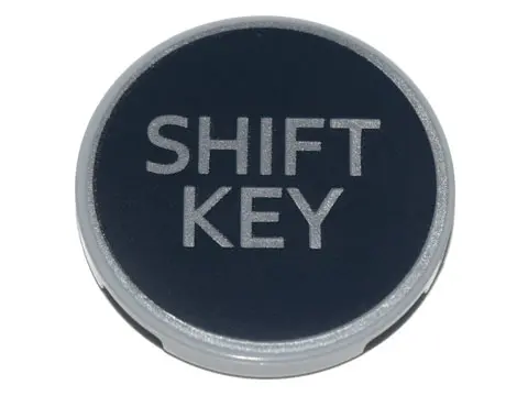 Light Bluish Gray Tile, Round 3 x 3 with Silver 'SHIFT KEY' on Black Background Pattern