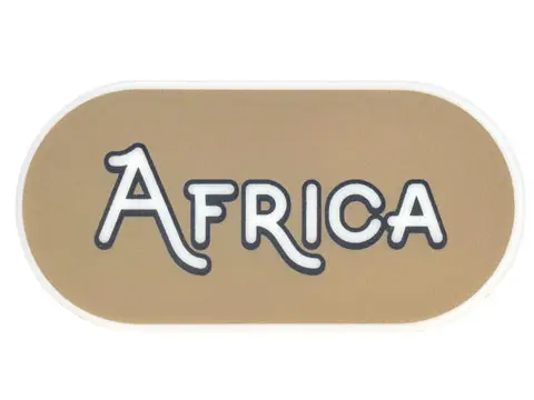 Glow In Dark White Tile, Round 2 x 4 Oval with Black Outline 'AFRICA' on Dark Tan Background Pattern