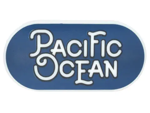 Glow In Dark White Tile, Round 2 x 4 Oval with Black Outline 'PACIFIC OCEAN' on Dark Blue Background