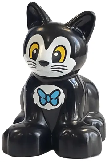 Black Duplo Cat Kitten Sitting with Yellow Eyes and White Face and Chest with Bow Tie Pattern