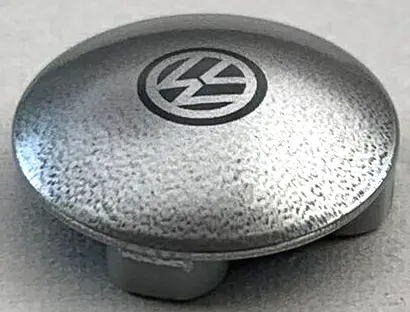 Light Bluish Gray Plate, Round 2 x 2 with Rounded Bottom (Boat Stud) with Black VW Logo on Silver Ba