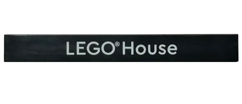 Black Tile 1 x 8 with White 'LEGO House', Bold Font Pattern