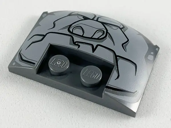 Dark Bluish Gray Wedge 3 x 4 x 2/3 Triple Curved with Light Bluish Gray Rock Creature Face Pattern