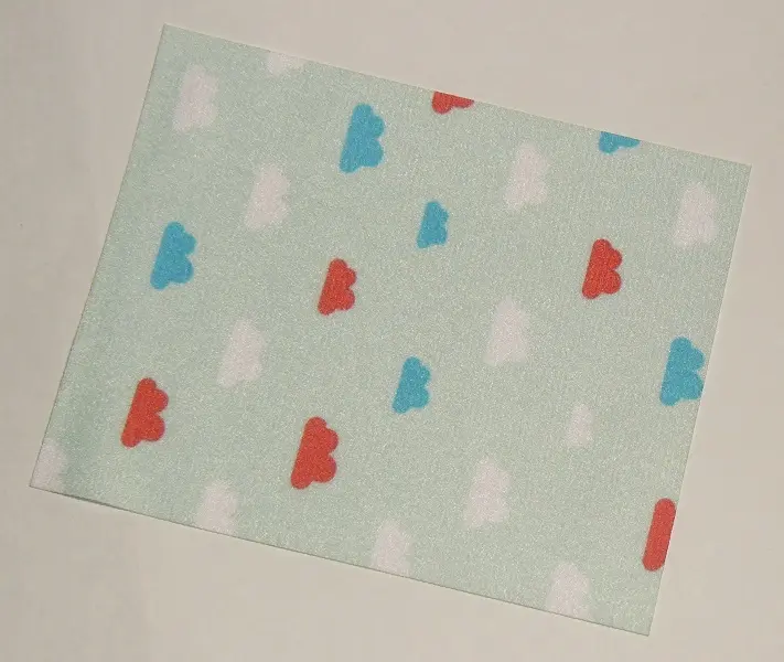 White Duplo, Cloth Blanket 8 x 10 cm with Red and Blue Clouds on Light Aqua Background Pattern