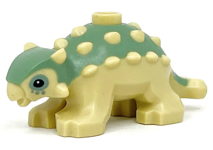 Tan Dinosaur Ankylosaurus Baby with Sand Green Back and Black Eyes Pattern