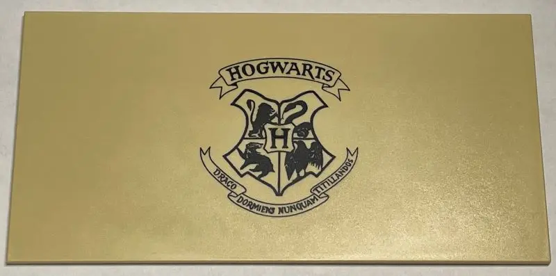 Tan Tile 8 x 16 with Bottom Tubes, Textured Surface with Hogwarts Crest Pattern (First Version with 