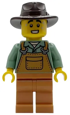 - Male, Medium Nougat Overalls over Sand Green Shirt, Medium Nougat Legs, Dark Brown Fedora, Sweat