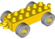 Yellow Duplo Car Base 2 x 6 with Open Hitch End and Light Bluish Gray Wheels with Fake Bolts