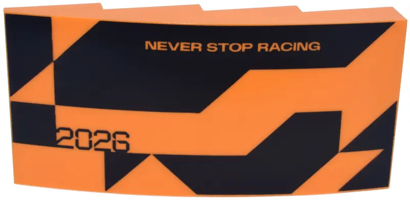 Slope, Curved 8 x 4 x 1 2/3 with Black Triangle, Angled Shapes and Stylized '2026', 'NEVER STOP RACI