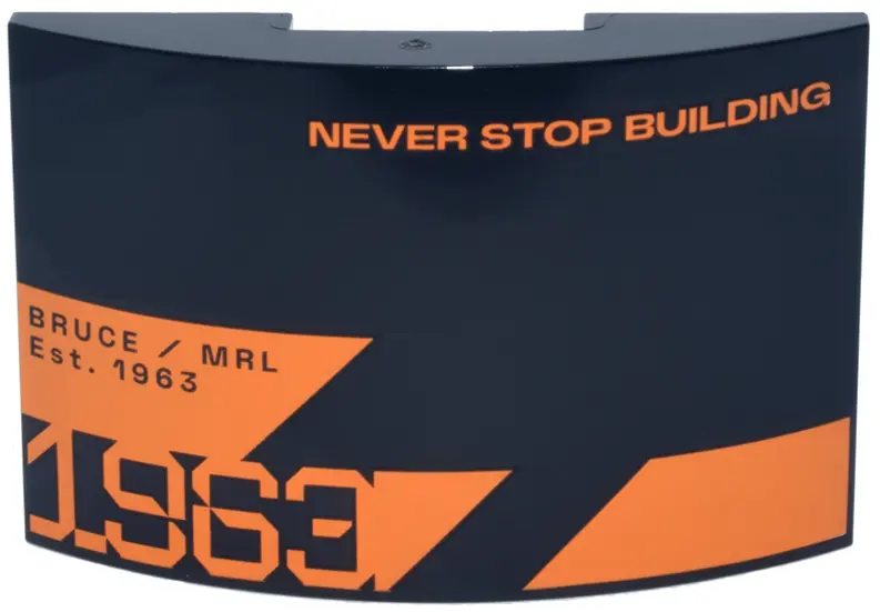 Slope, Curved 6 x 4 Double with Orange 'NEVER STOP BUILDING', Stylized '1963', Triangle and Trapezoi